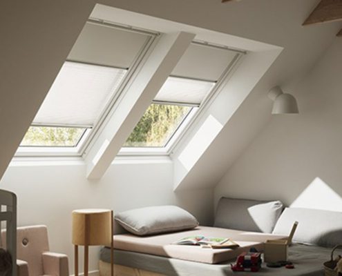 Loft Blinds with light coming through